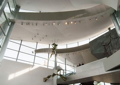 The many layers of the ceiling in the Hunter Museum lobby with two suspended sculptures.