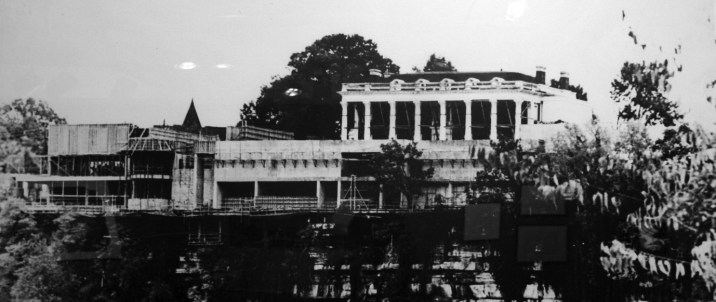 Black and white photo of the Hunter Mansion under construction.