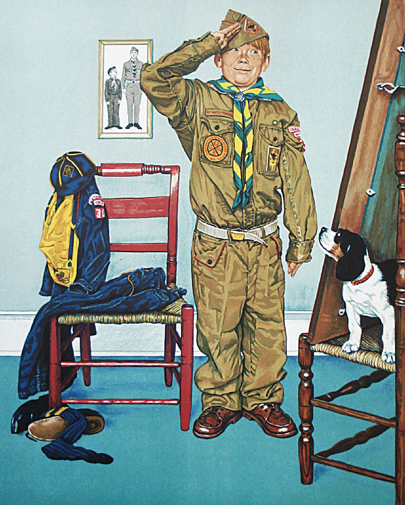 A young boy in an ill fitting uniform salutes. Behind him is an image of him with an older man in uniform. His clothes are piled on a chair next to him.