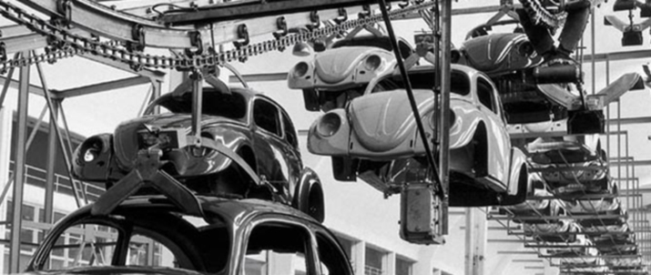 Volkswagen Beetles on an assembly line.