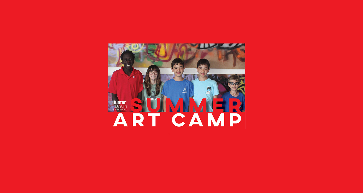 A row of children posing for a picture in front of graffiti with the text, "Summer Art Camp."